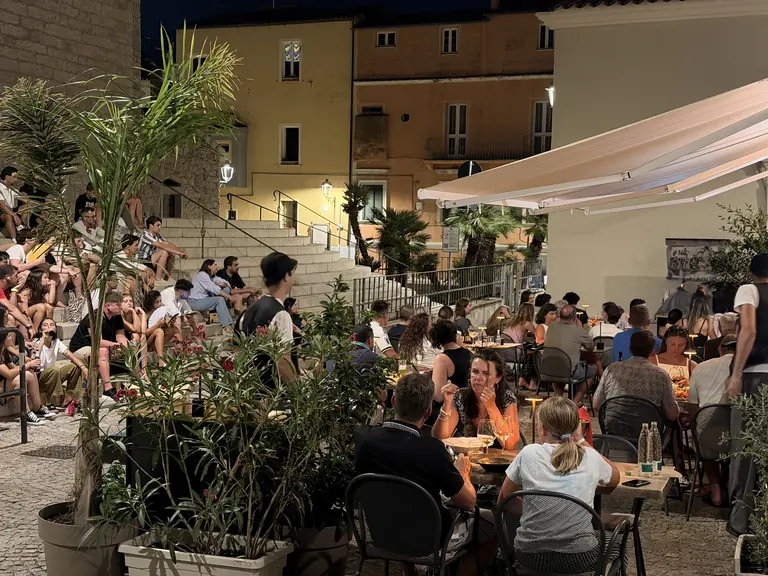 Kombo Street's dining room with the Basilica of San Paolo behind